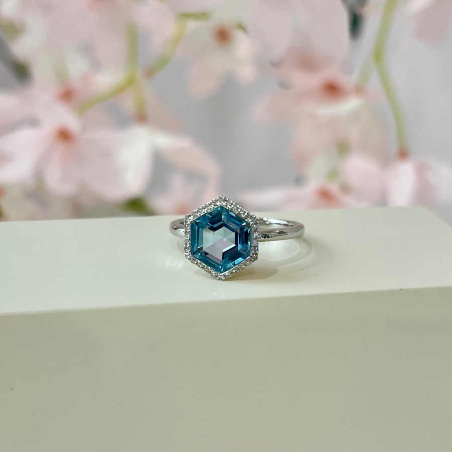 Hexagon Blue Topaz & Diamond Halo Ring in 9ct White Gold