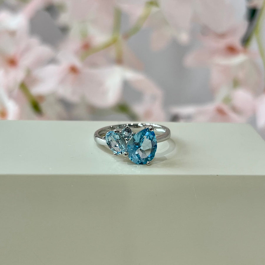Three Stone Blue Topaz Ring in 9ct White Gold