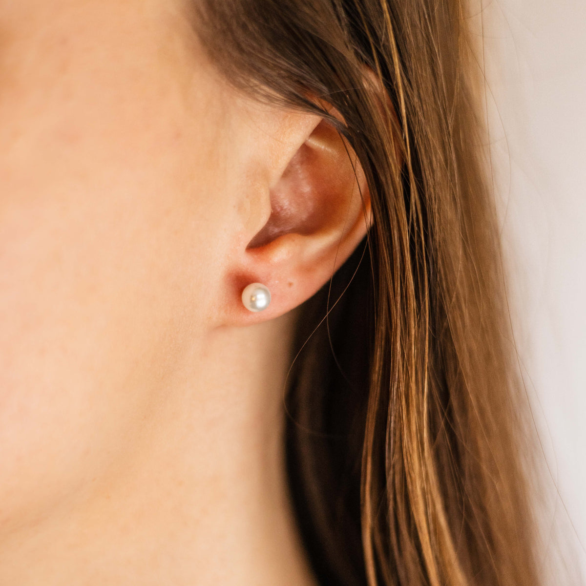 These staple simple pearl ball stud earrings are an everyday staple on their own or perfect for completing your ear stack.  925 Sterling Silver. E1025/3,4,5,6