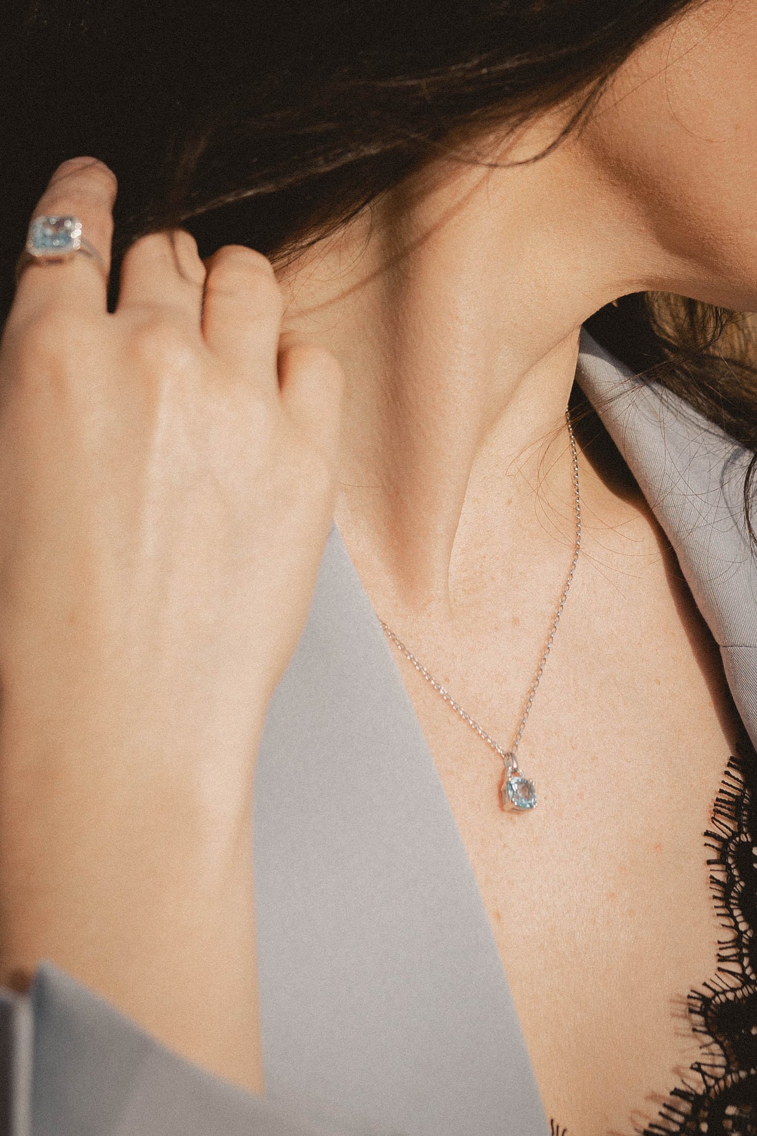 Cushion Cut Blue Topaz and Diamond Pendant in 9ct White Gold