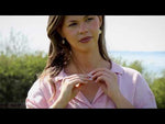 video of a women wearing a 9ct gold dara knot necklace